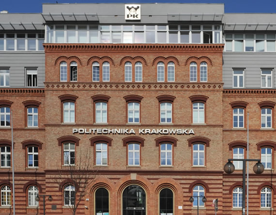 Zdjęcie budynku Politechniki Krakowskiej z czerwonej cegły. Nad wejściem duży napis Politechnika Krakowska.